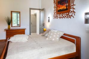 Postel nebo postele na pokoji v ubytování Casa nelle Langhe A
