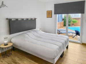 Postel nebo postele na pokoji v ubytování Gîte 2 Newlook