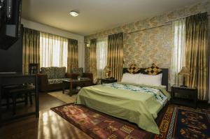 Llit o llits en una habitació de Nirvana Home