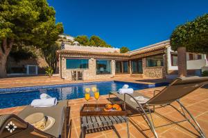 Fotografia z galérie ubytovania Villa Gaviota Blanca by Abahana Luxe v destinácii Benissa