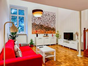 Μια τηλεόραση ή/και κέντρο ψυχαγωγίας στο InCentro Apartment - San Daniele del Friuli +10 φωτογραφίες