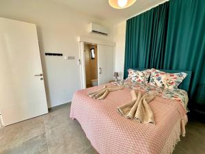 Postel nebo postele na pokoji v ubytování DeJablue Phase 2, block T2, unit 3