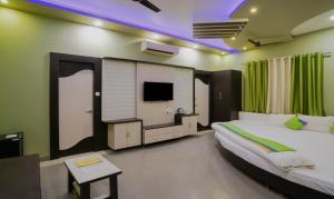 Hotel Raj Garden客房内的一张或多张床位