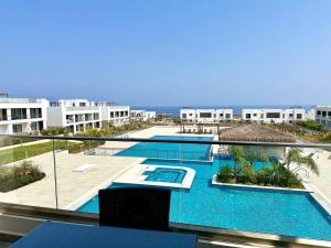 Πισίνα στο ή κοντά στο Deja Blue block C unit 19