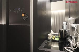 Kuchyň nebo kuchyňský kout v ubytování Sangju Stay201 Hotel
