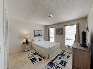 En eller flere senge i et værelse på Buena Vida Townhomes #28 + 25 billeder