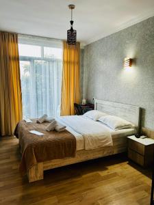 Postel nebo postele na pokoji v ubytování Hotel Marioni