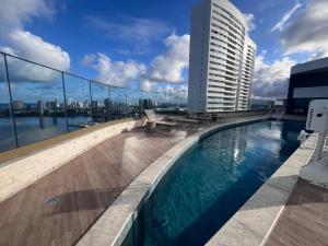 Πισίνα στο ή κοντά στο Flat de Luxo no Parque do Cais