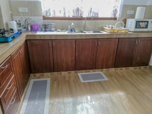 Kuchyň nebo kuchyňský kout v ubytování Shalom Villa
