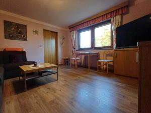 TV in/ali zabaviščno središče v nastanitvi Haus Reinstadler