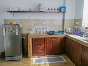 Kuchyň nebo kuchyňský kout v ubytování Shalom Villa