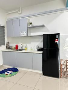 Kuhinja ili čajna kuhinja u objektu Seremban Pool View 5-6 pax Suite