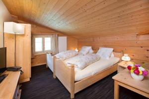 Postel nebo postele na pokoji v ubytování Boutique-Hotel Vincenz