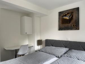 Postel nebo postele na pokoji v ubytování Hotel Sternen