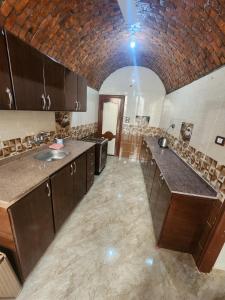 A kitchen or kitchenette at Dara guest House