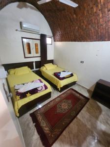 Postel nebo postele na pokoji v ubytování Dara guest House
