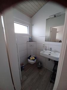 Koupelna v ubytování Ferienhaus MEERZeit