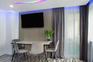 Un televizor și/sau centru de divertisment la Modern Apartments Neuburg 3 - New