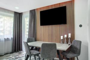 Μια τηλεόραση ή/και κέντρο ψυχαγωγίας στο Modern Apartments Neuburg 8 - New