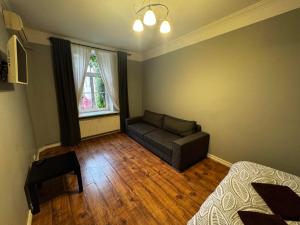 Postel nebo postele na pokoji v ubytování ApartHotel Riga