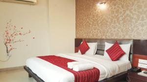 Postel nebo postele na pokoji v ubytování Hotel Delhi Aerocity, NH 48
