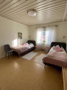 Postel nebo postele na pokoji v ubytování Snöå Bruk Hotell och konferens