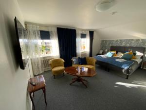 Postel nebo postele na pokoji v ubytování Snöå Bruk Hotell och konferens