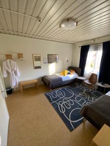 Postel nebo postele na pokoji v ubytování Snöå Bruk Hotell och konferens