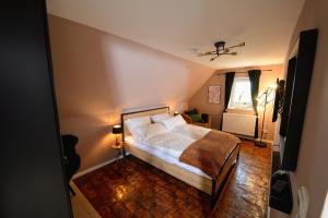 Postel nebo postele na pokoji v ubytování Suite Petite - Ferien und Businessapartment