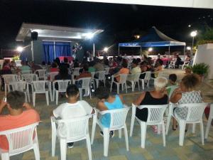 a group of people sitting in chairs at a party at Residence Soleluna in Praia a Mare +102 photos