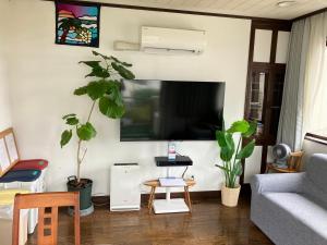 Een TV en/of entertainmentcenter bij Marina Bay Atami
