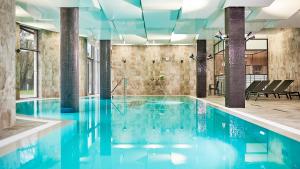 Bazén v ubytovaní VacationClub - Diune Hotel Apartament 115 alebo v jeho blízkosti