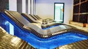 Bazén v ubytovaní VacationClub - Diune Hotel Apartament 115 alebo v jeho blízkosti