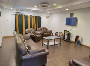 Et tv og/eller underholdning på Kente Heritage Lodge - Bonwire