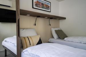 EuroParcs Het Amsterdamse Bos客房内的一张或多张床位