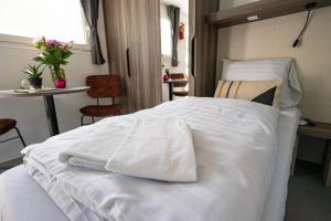 EuroParcs Het Amsterdamse Bos客房内的一张或多张床位