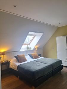 Postel nebo postele na pokoji v ubytování Hoeve Montigny B&B