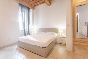 Ένα ή περισσότερα κρεβάτια σε δωμάτιο στο Suite n1 - Elegante trilocale in centro