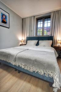 Postel nebo postele na pokoji v ubytování Happy Street Hostel