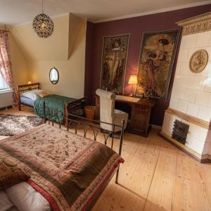 Postel nebo postele na pokoji v ubytování Ferienwohnung Anno1898 Zittau