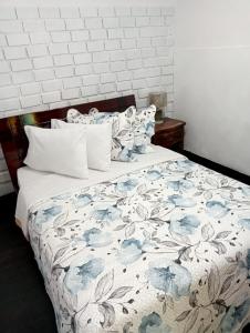 Postel nebo postele na pokoji v ubytování Hostal Hanoi en Bogotá + 37 fotografií