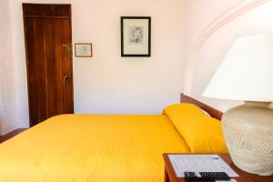 Postel nebo postele na pokoji v ubytování Hotel Antillano + 35 fotografií