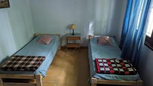 Postel nebo postele na pokoji v ubytování Casa tipo chalet en Miramar + 1 fotografie