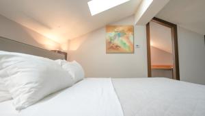 Posteľ alebo postele v izbe v ubytovaní Hotel Europa