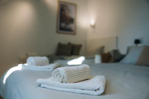 Ένα ή περισσότερα κρεβάτια σε δωμάτιο στο Michelle's Studio, City center +7 φωτογραφίες