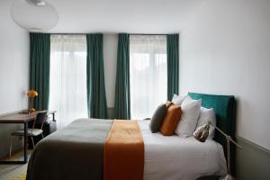 Letto o letti in una camera di La Closerie des Capucines