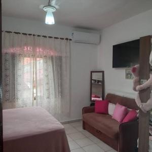 Ένα ή περισσότερα κρεβάτια σε δωμάτιο στο Apartamento com piscina condomínio Tapitema +7 φωτογραφίες