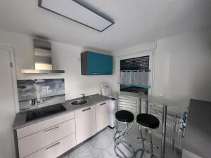 Kuchyň nebo kuchyňský kout v ubytování Stilvolle 2-Zimmer-Oase