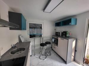 Kuchyň nebo kuchyňský kout v ubytování Stilvolle 2-Zimmer-Oase + 15 fotografií