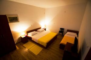 Postel nebo postele na pokoji v ubytování Apartments Žile